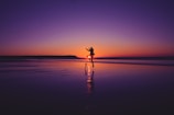 A stylish couple enjoying a sunset together, radiating joy.