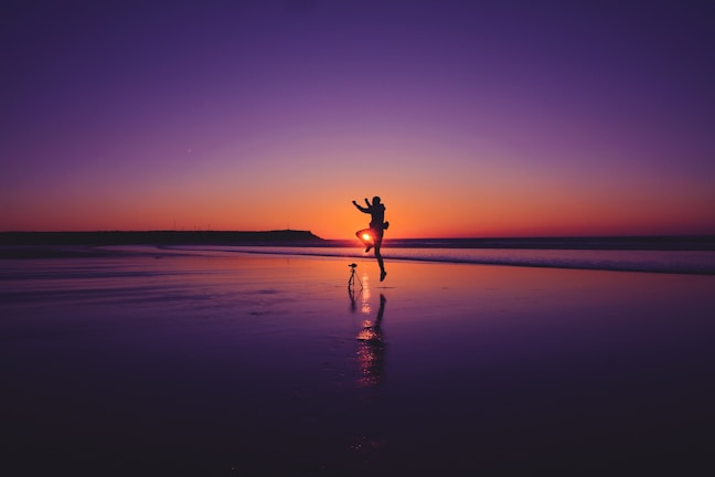 A stylish couple enjoying a sunset together, radiating joy.