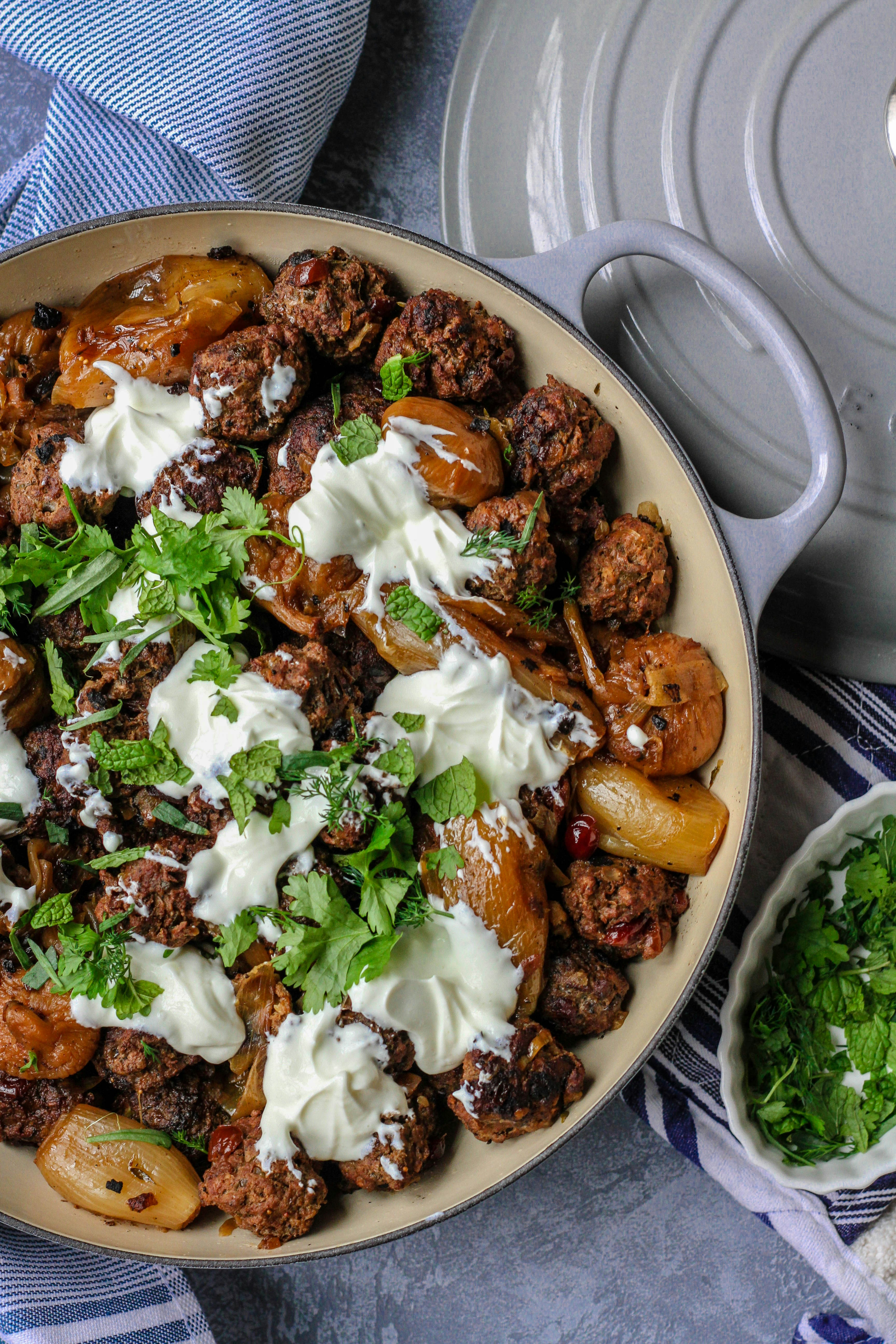 Cooking from Jerusalem: A Cookbook for a cookbook review. Lamb meatballs with cranberries (swapped for barberries), yogurt and mint. Big hit at cookbook club!