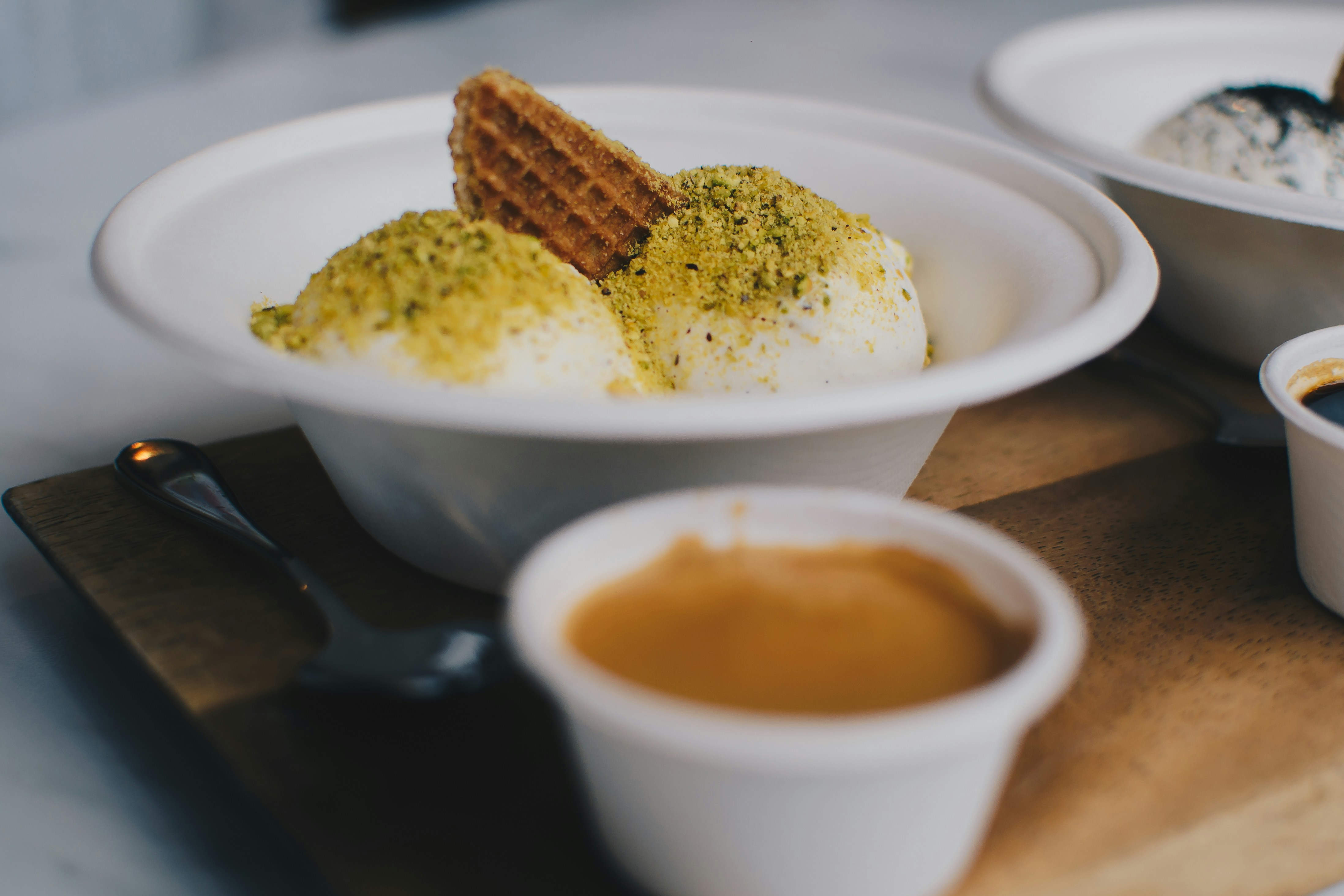 white ceramic bowl and cup on brown table, Affogato