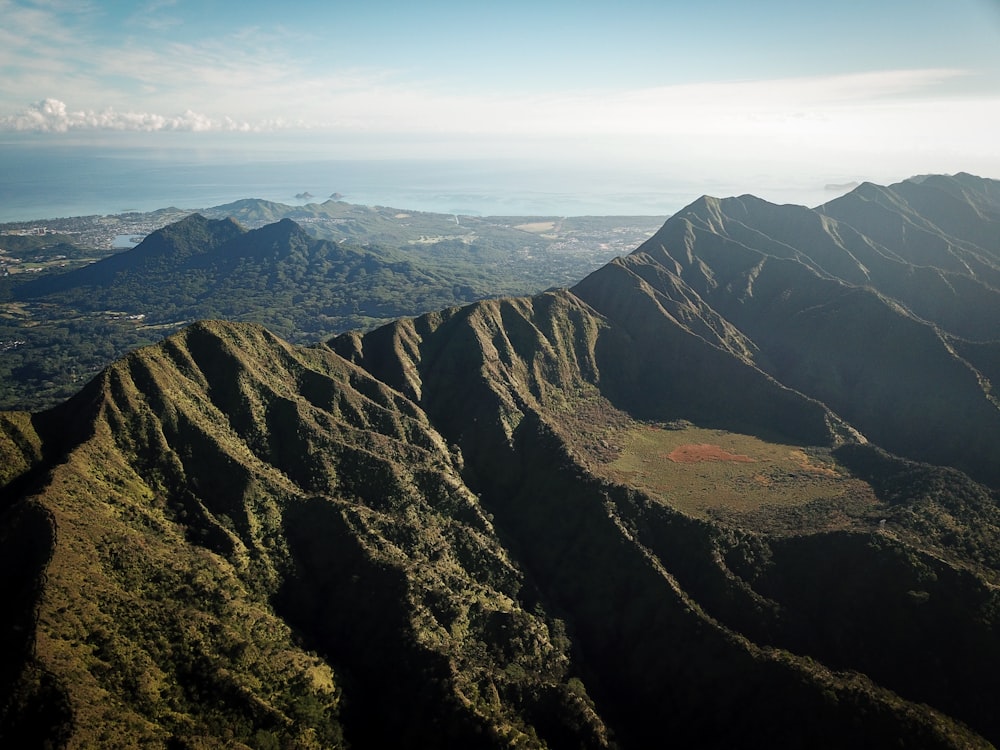 landscape photography of mountains surrounded by trees