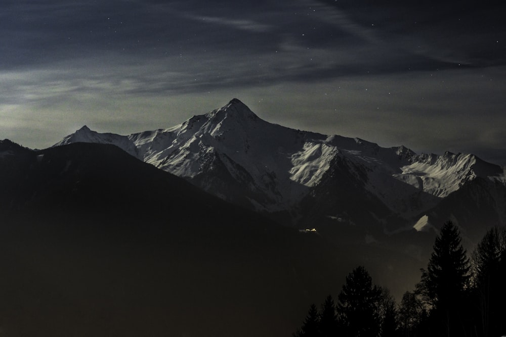 snow capped mountain under blue sky