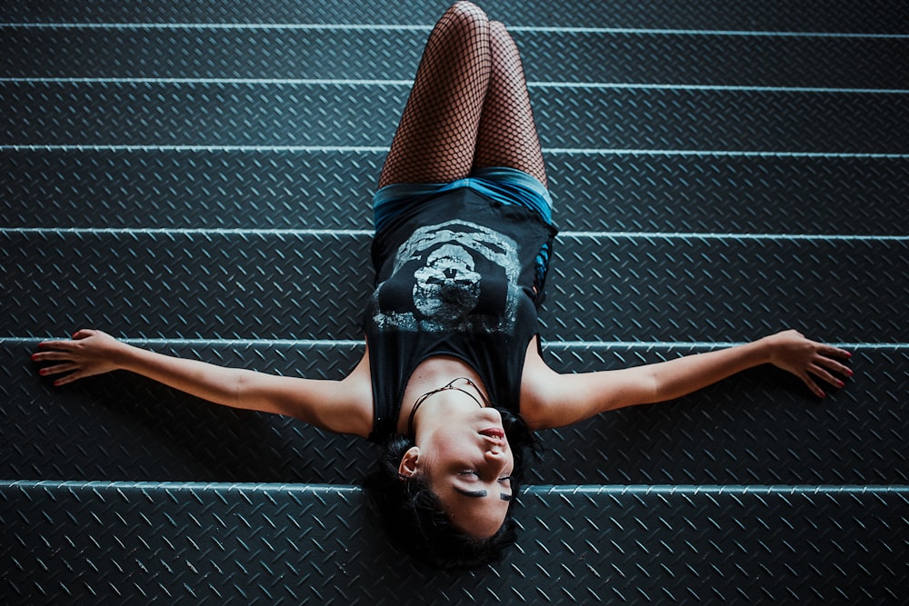 woman lying on staircase