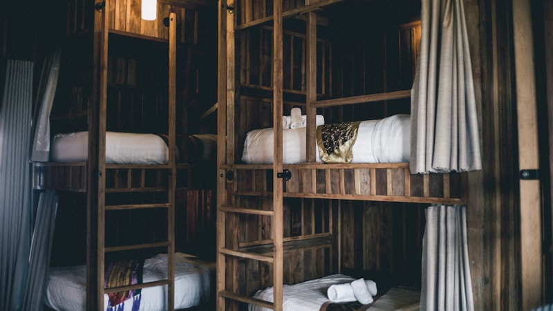 Cozy wooden bunkhouse interior with bunk beds