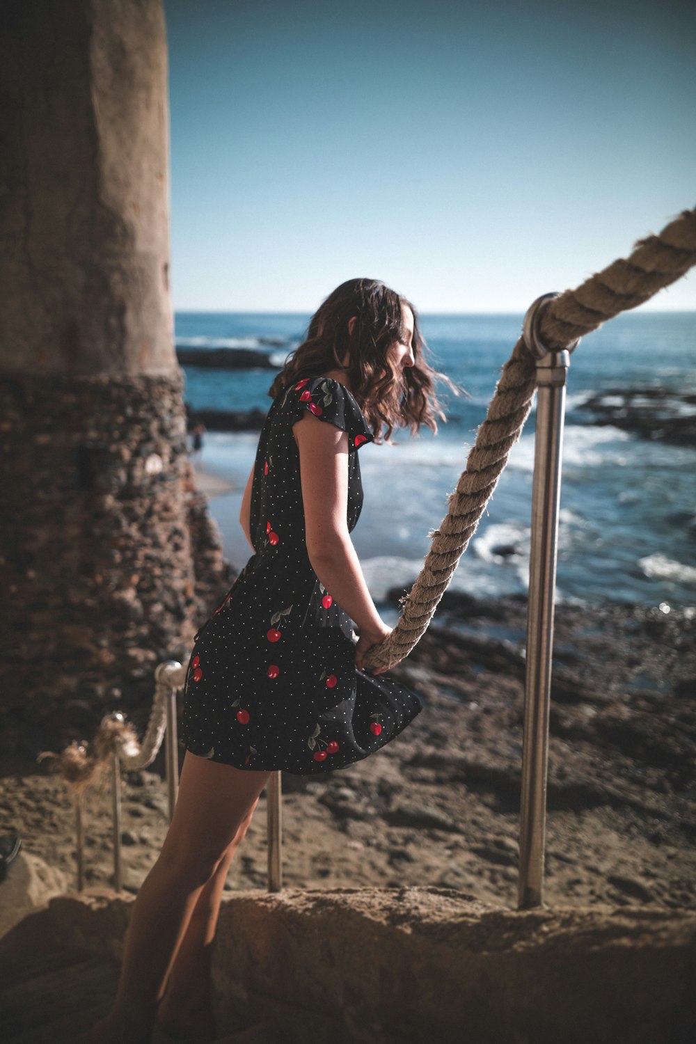 woman standing near rope