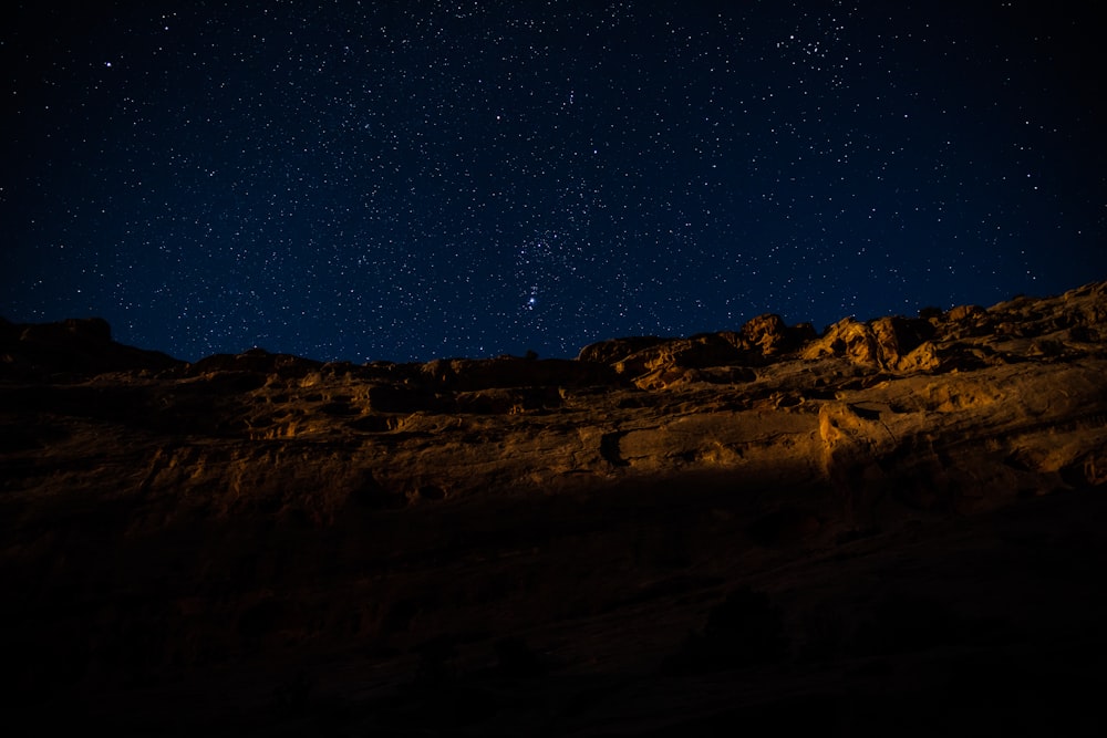 landscape photography of hill during nighttime