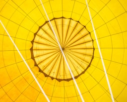 the inside of a yellow hot air balloon