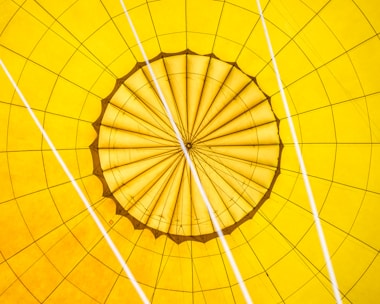 the inside of a yellow hot air balloon