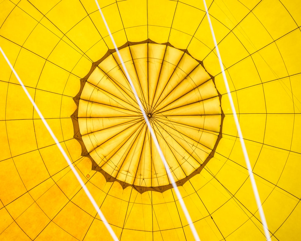 the inside of a yellow hot air balloon