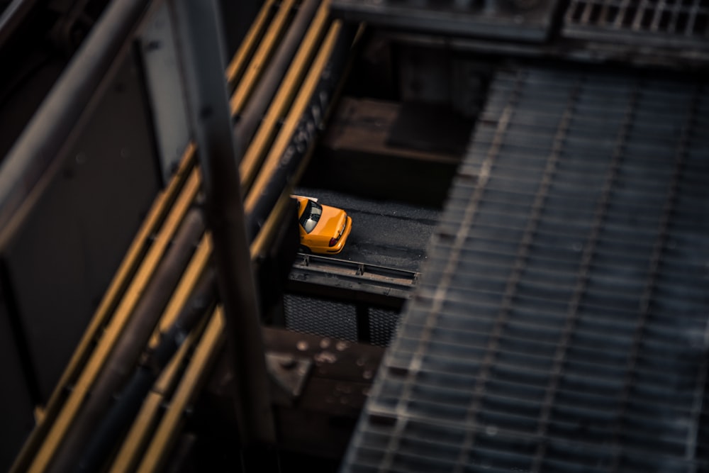 low-angle photography of orange car