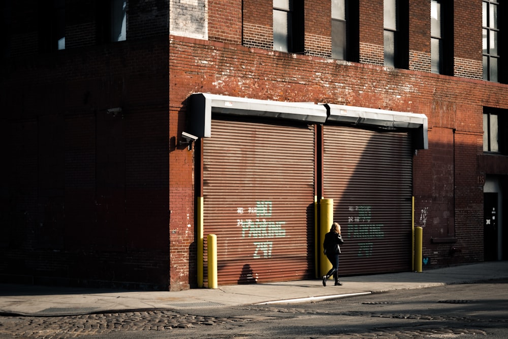 person walking on alley