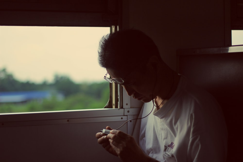 man carrying earphones