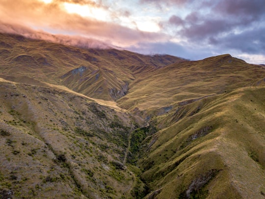 green mountain during daytime in Cardrona New Zealand