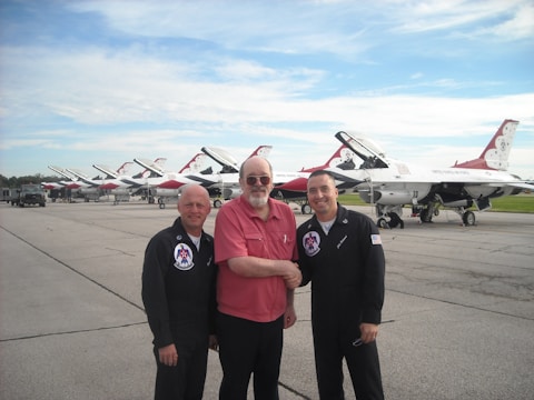 A successful aviation team celebrating a project completion.