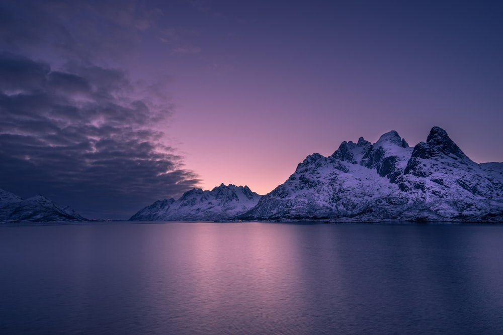 body of water near mountain