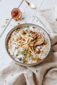 photo of bowl with cooked food on table