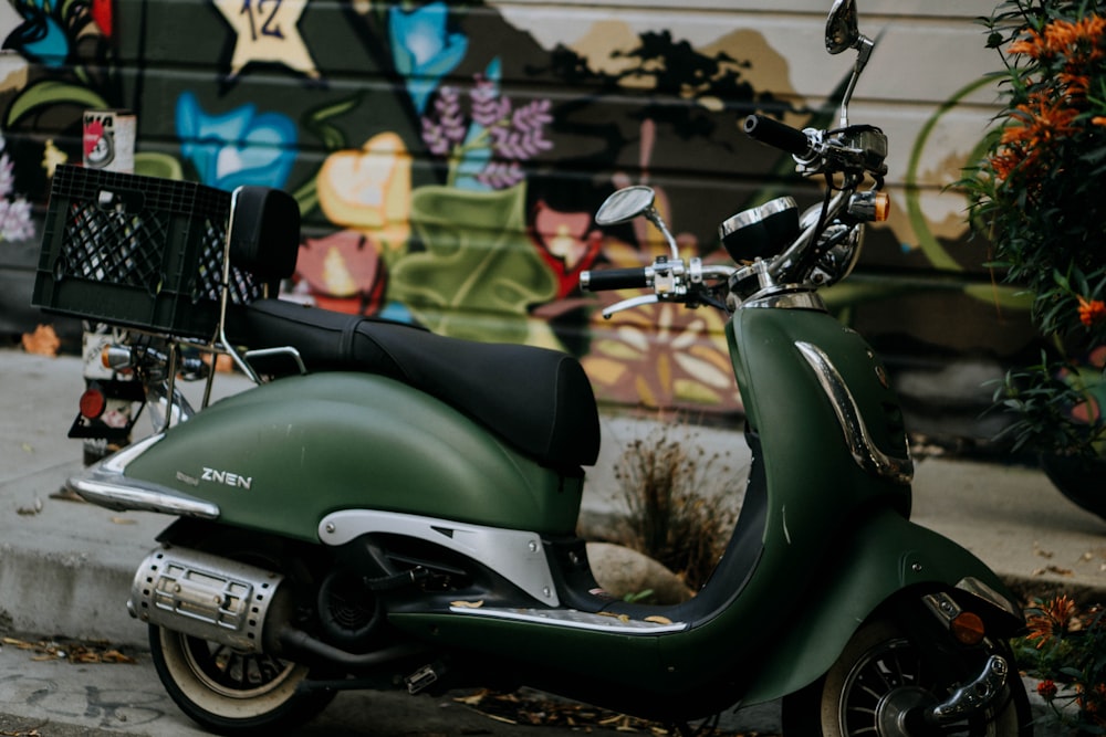 green motor scooter near plastic crates