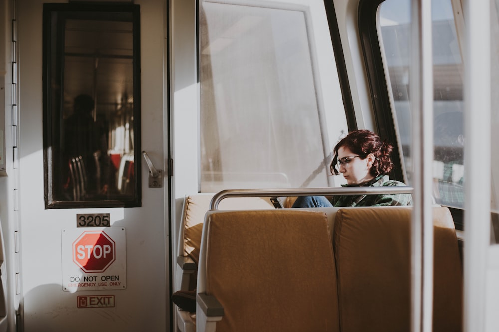 woman sitting in train