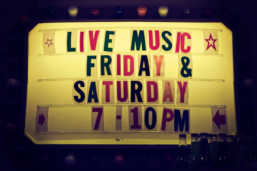 Outdoor marquee that says, Live Music Friday & Saturday 7-10PM