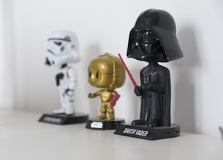 Star wars Darth Vader. Stormtrooper, and C-P30 bobbleheads beside each other