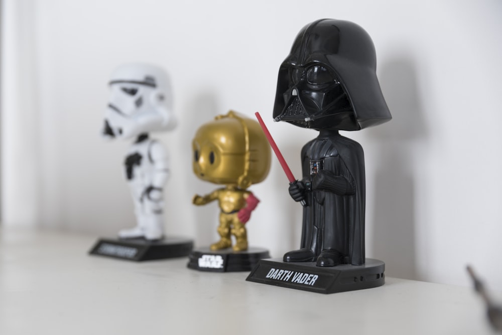 Star wars Darth Vader. Stormtrooper, and C-P30 bobbleheads beside each other