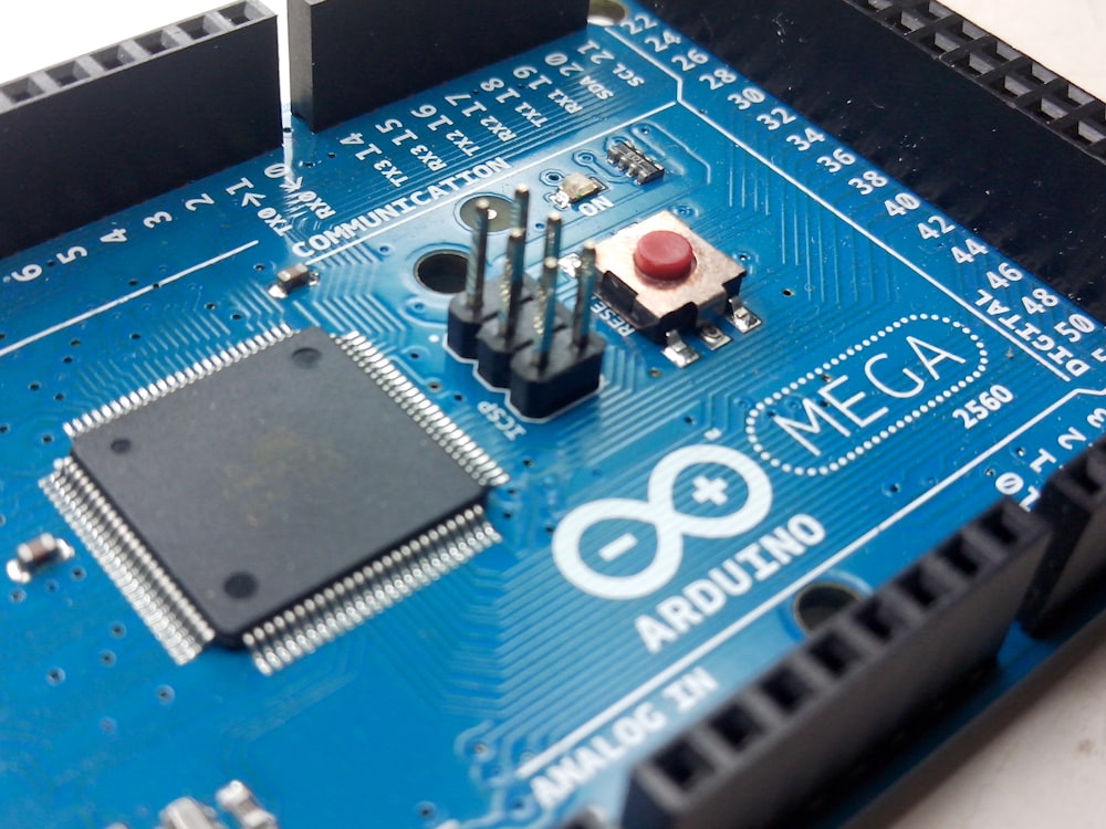 blue and black Arduino Mega circuit board