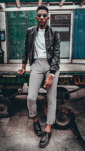 man in black jacket posing