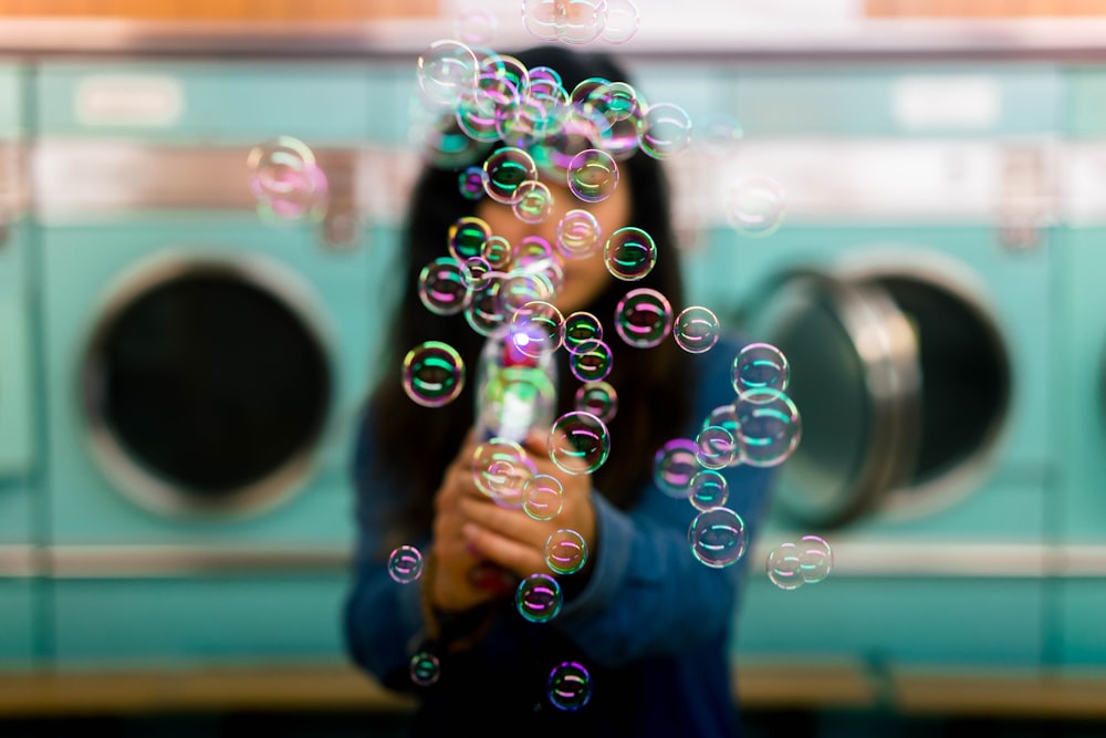 woman playing bubbles