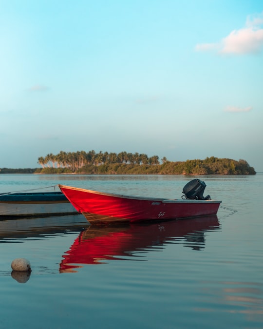 power boat parked in body of water in Hithadhoo Maldives