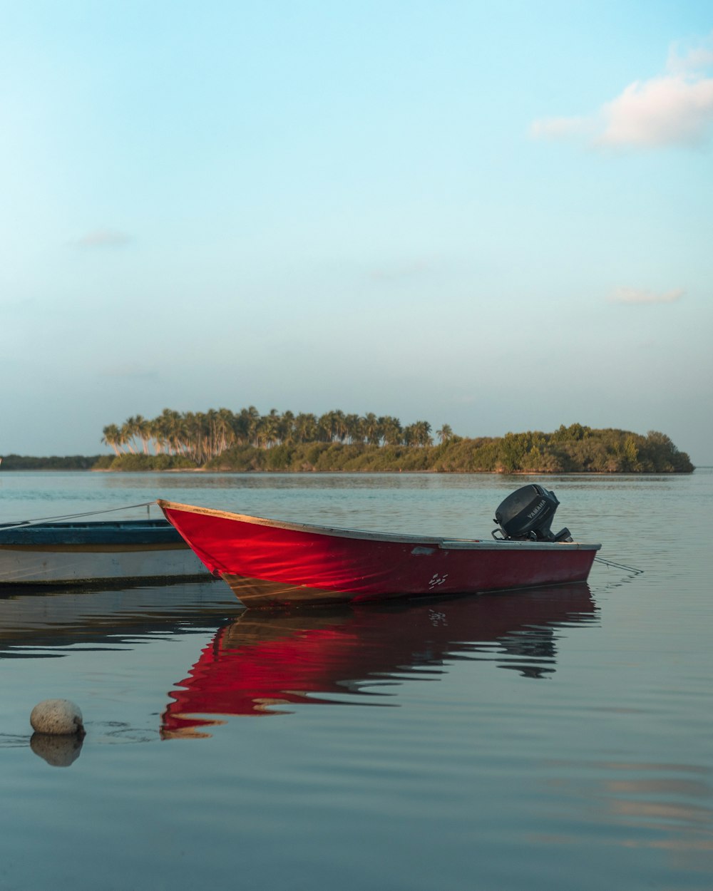 power boat parked in body of water