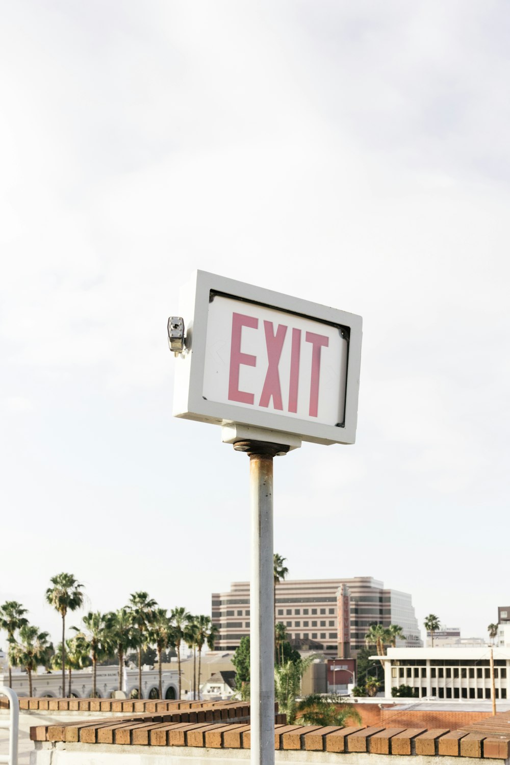 Exit signage near concrete building