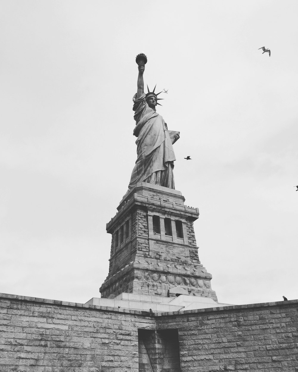 grayscale photography of Statue of Liberty