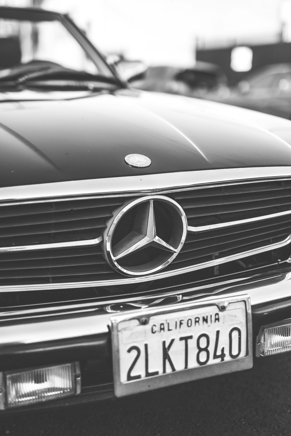 grayscale photo of Mercedes-Benz