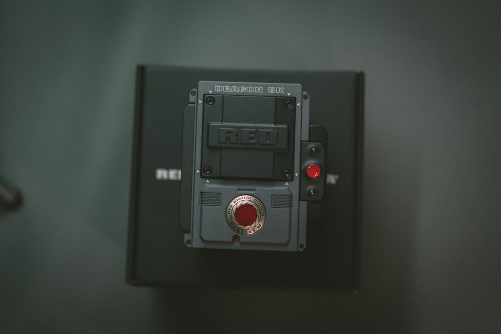 black and gray remote on black box