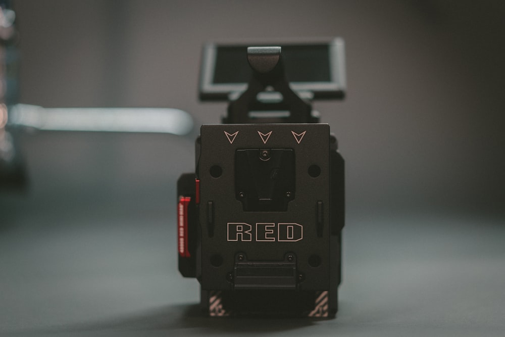 close-up photography of black Red plastic tool part