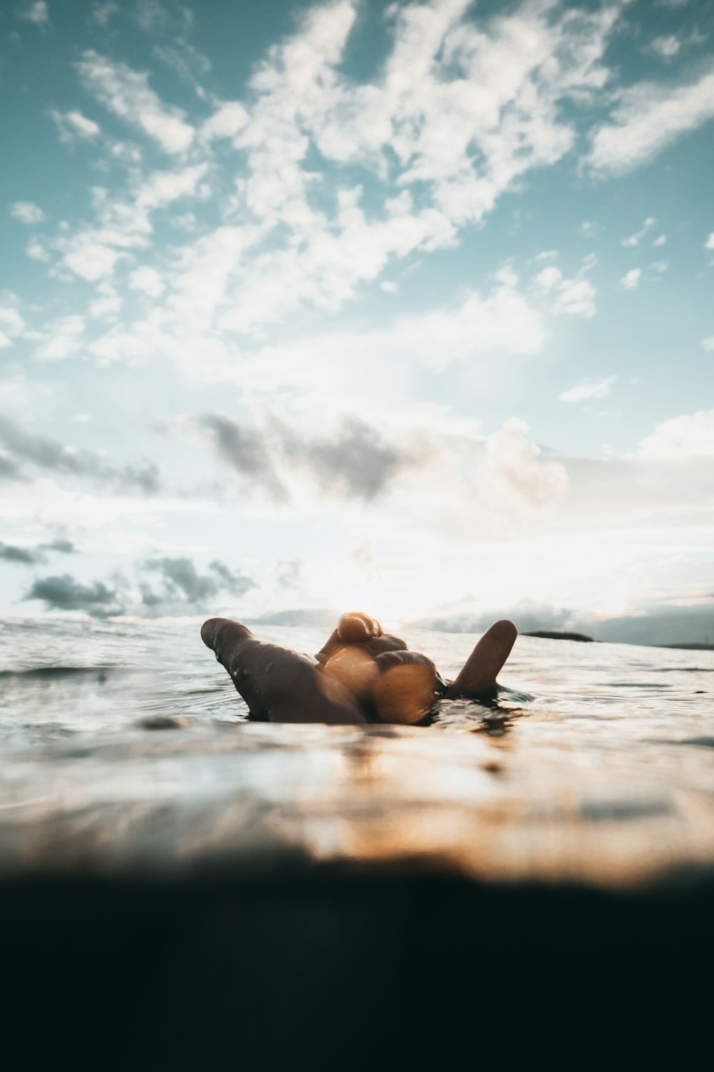 photo of person's submerging in body of water