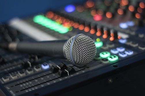 microphone on audio mixing console, sound doctor productions