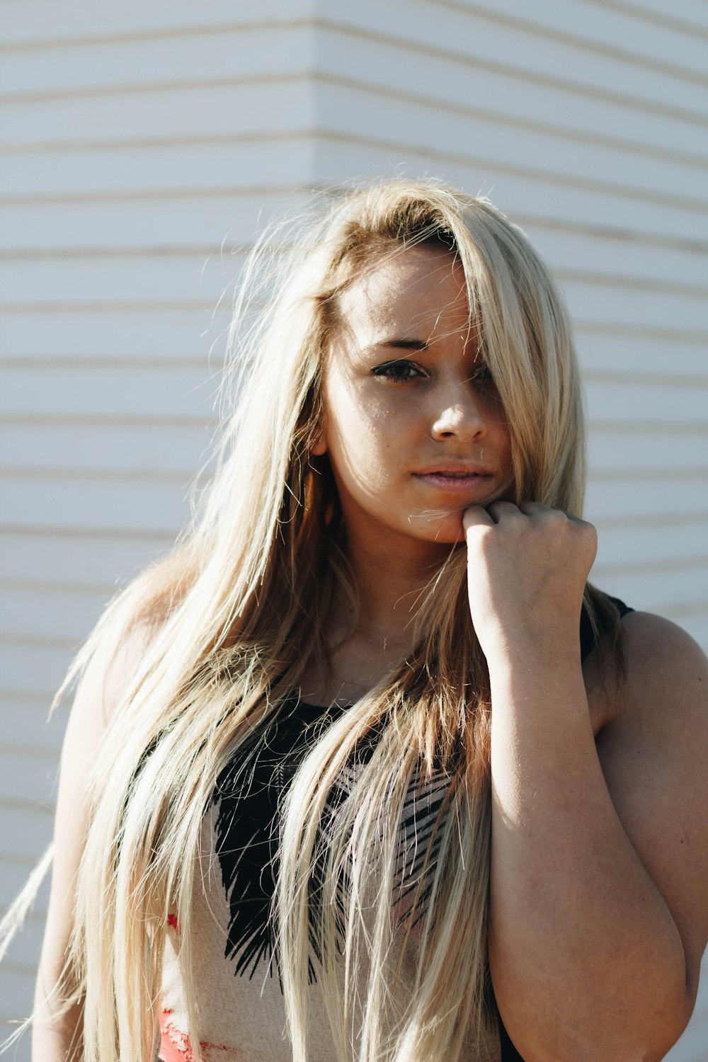 woman with black and gray sleeveless top