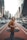 woman standing on middle of road