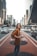 woman standing on middle of road