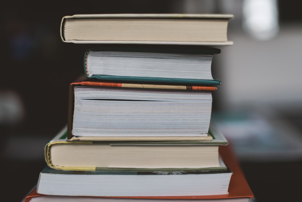 pile of assorted-color books