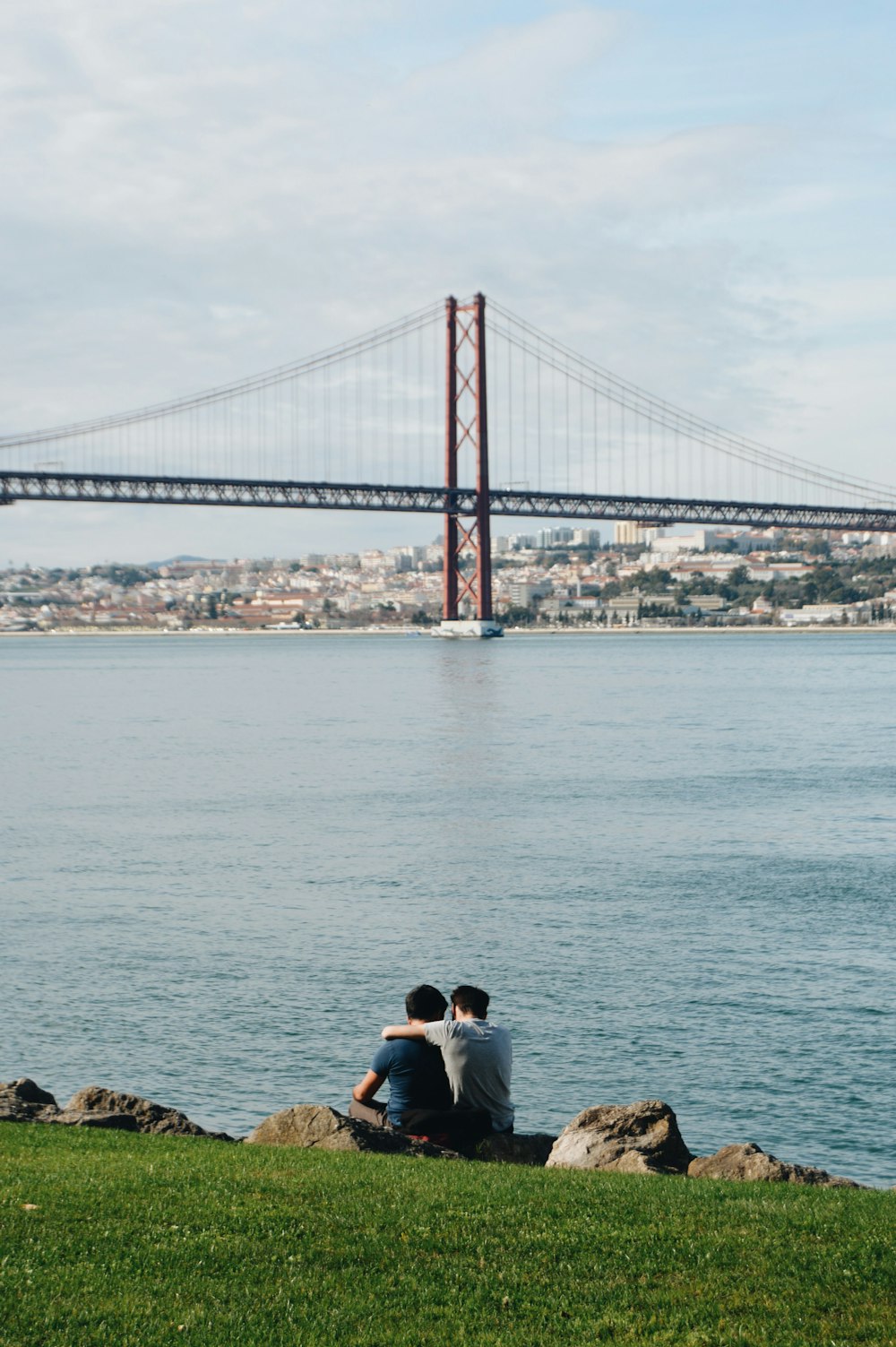 two man near to body of water