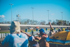 people watching car race