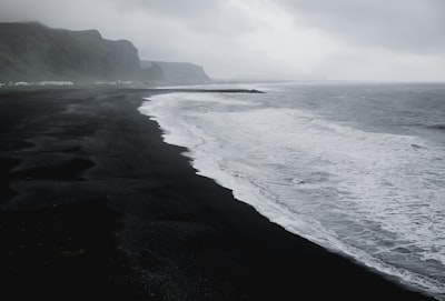 seashore in grayscale photo iceland google meet background