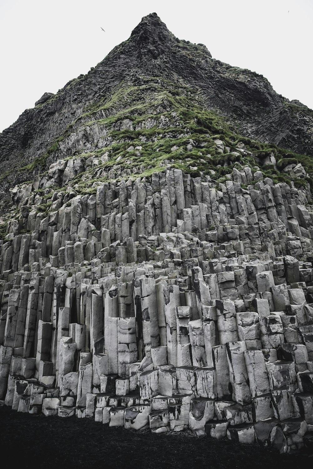 grass covered rock formation