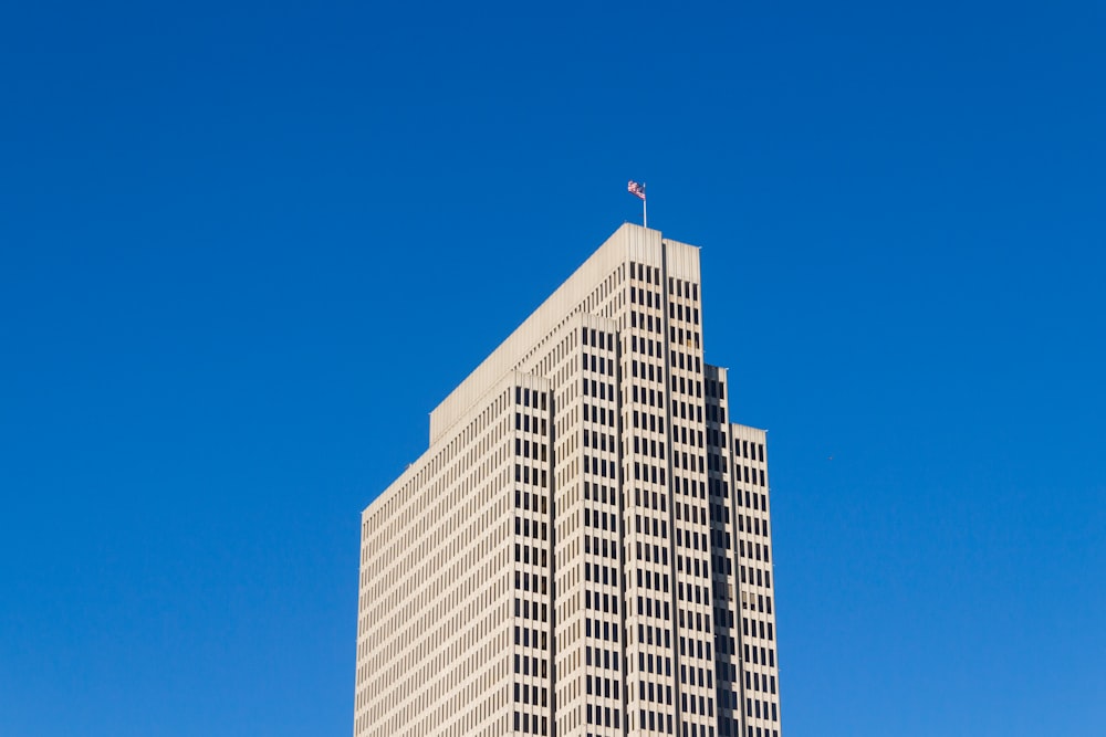 white concrete building under blue sky