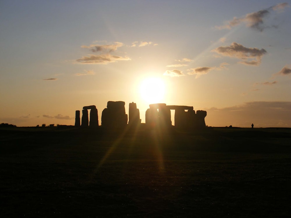 silhouette photography of Stone Hinge during golden hour