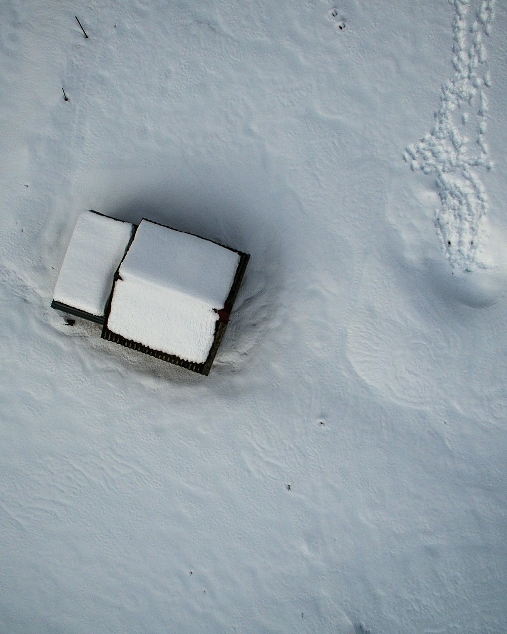 birds eye photography of house covered with snow