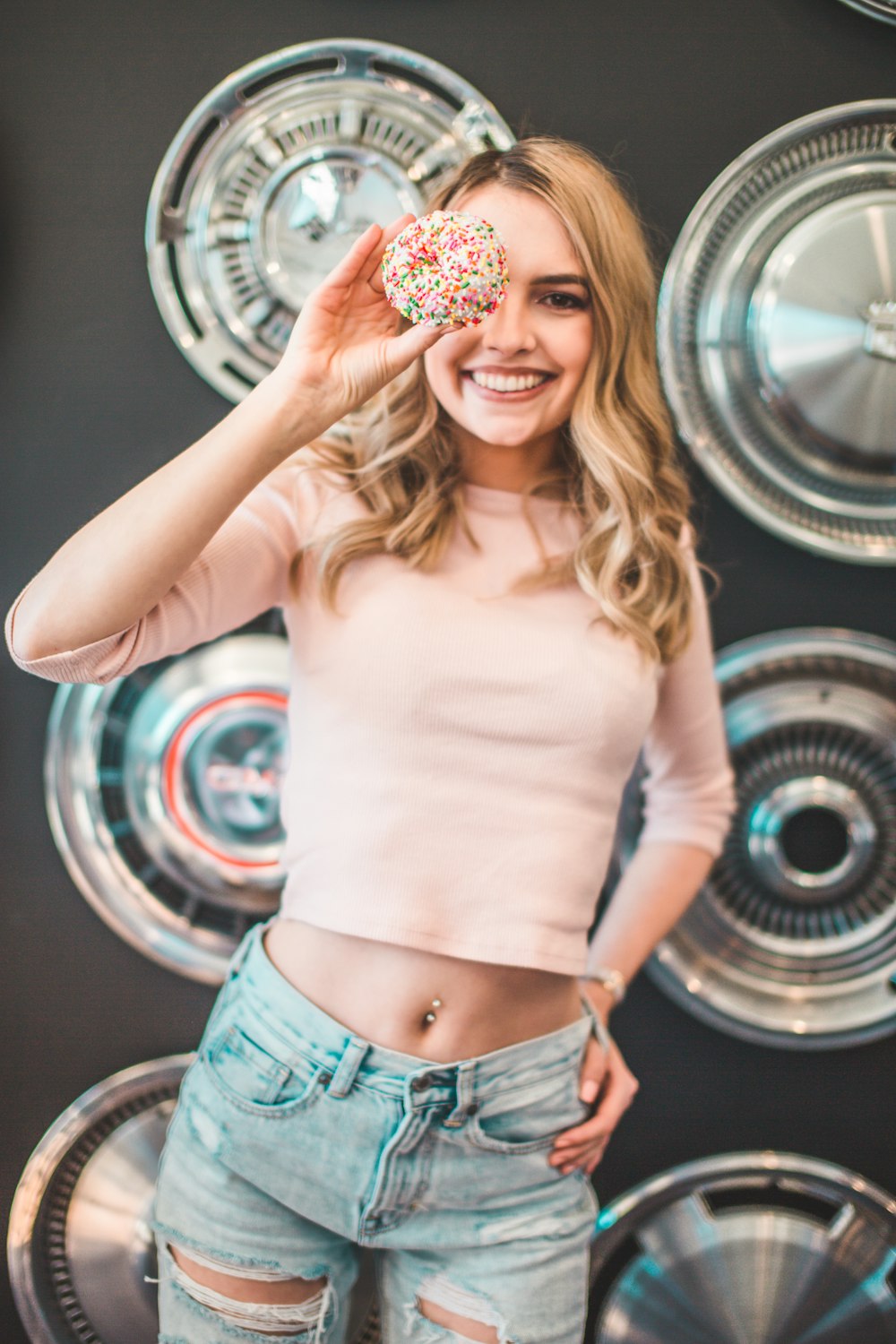 woman holding donut
