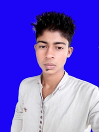 Photo showing a stylish young man wearing a Thai-style shirt in black and yellow tones.